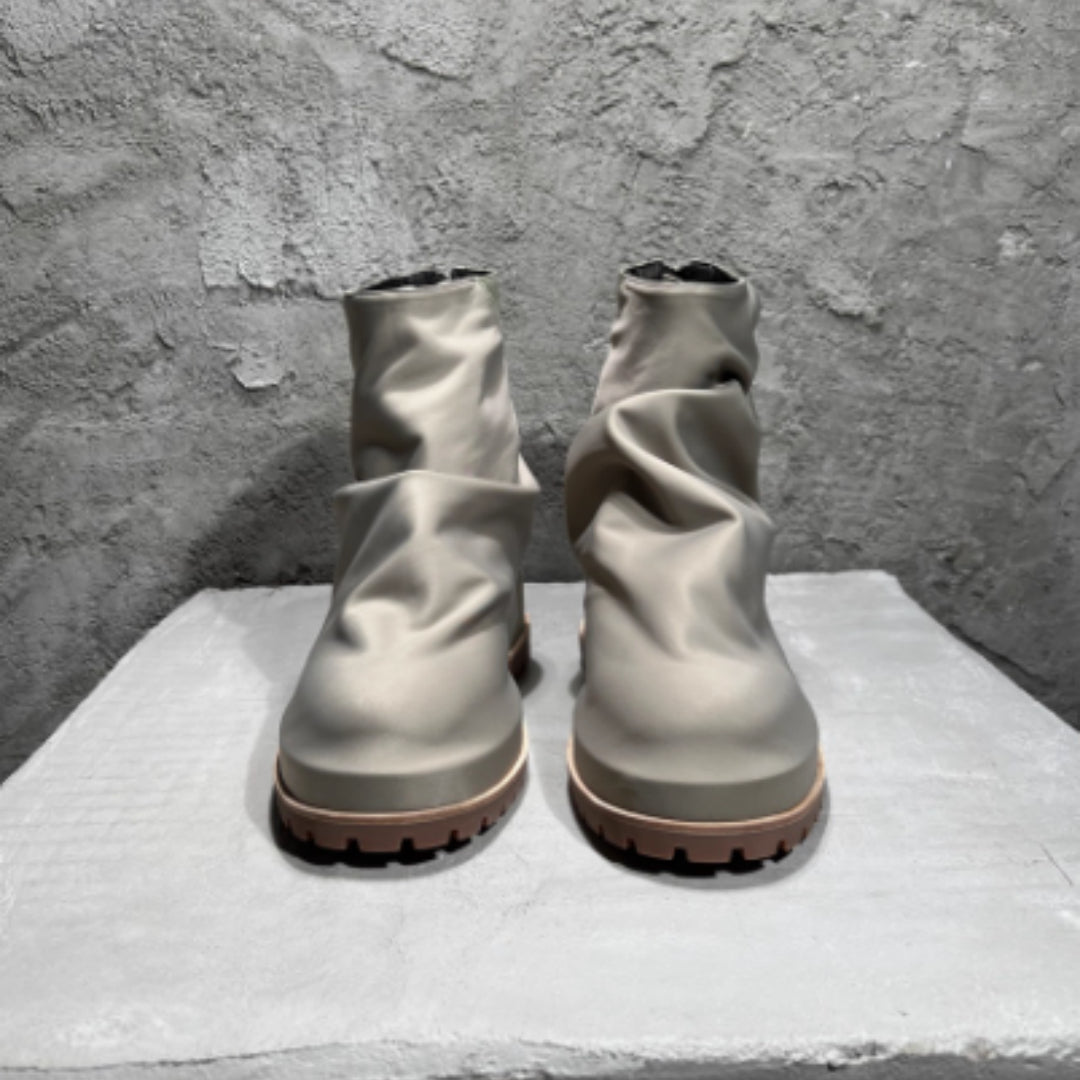 Bottes hautes plissées en cuir