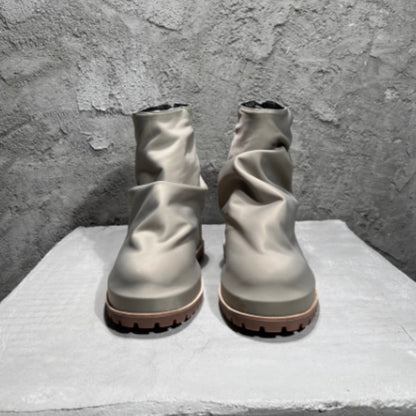 Bottes hautes plissées en cuir