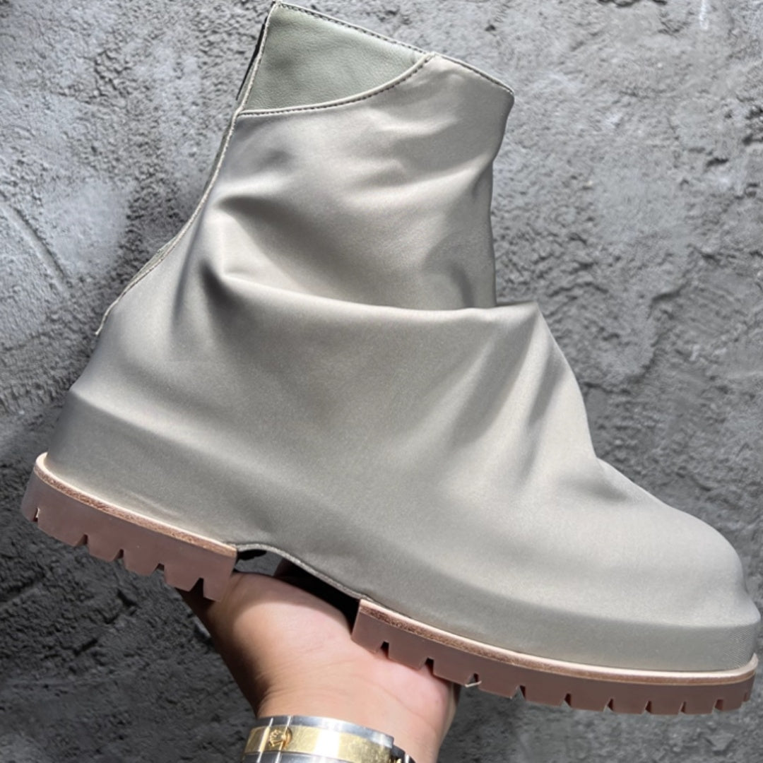 Bottes hautes plissées en cuir