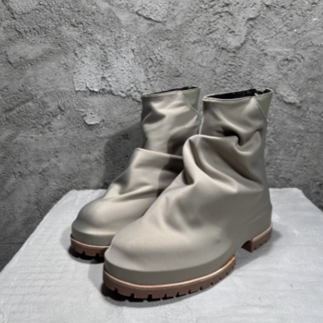 Bottes hautes plissées en cuir