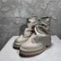 Bottes hautes plissées en cuir