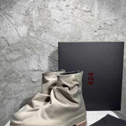 Bottes hautes plissées en cuir